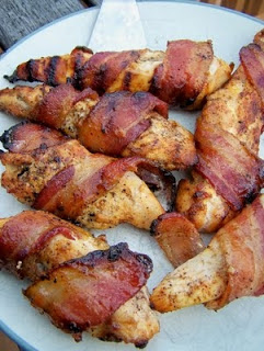 Sweet and spicy bacon chicken on a white plate. 