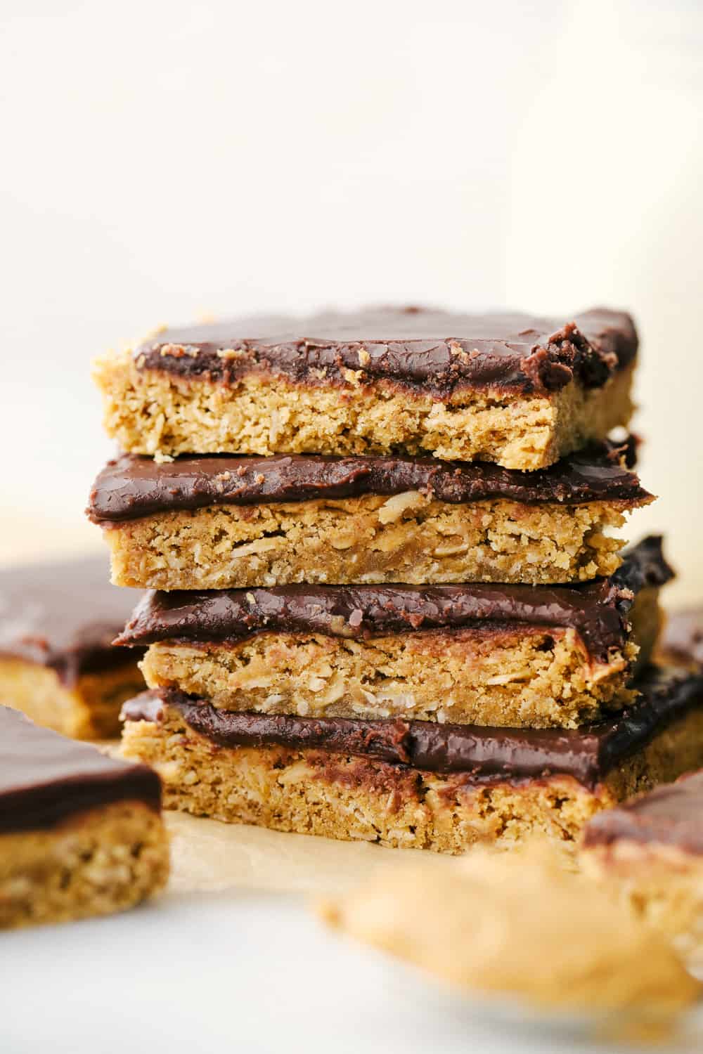 Peanut butter bars stacked on top of each other. 