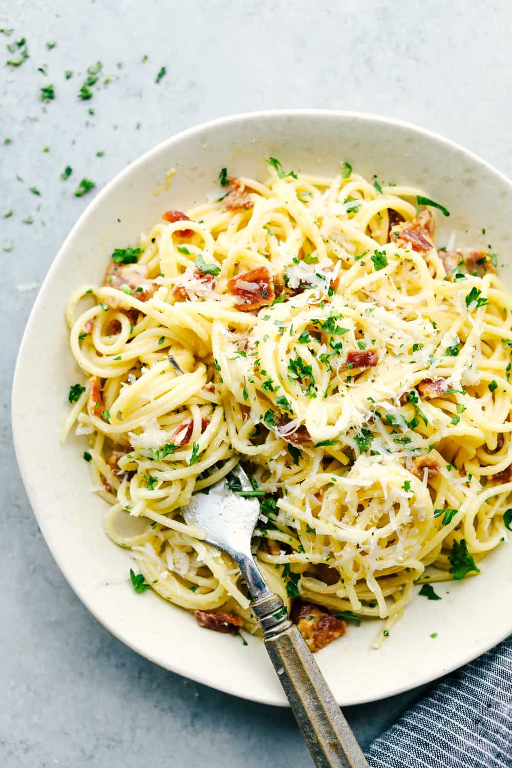 Creamy Bacon Carbonara on a white plate.