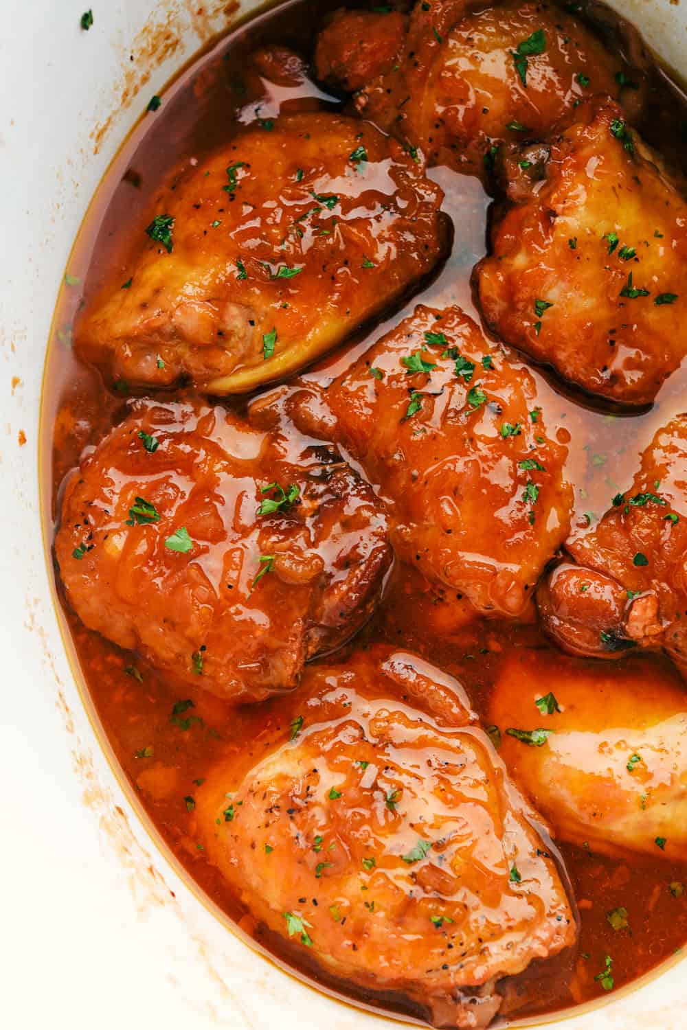 Chicken thighs in an apricot sauce in the crockpot.