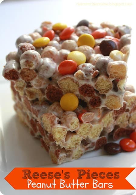 Reese's pieces peanut butter bars stacked on top of each other. 