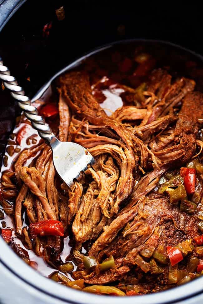 Beef carnitas in a slow cooker. 