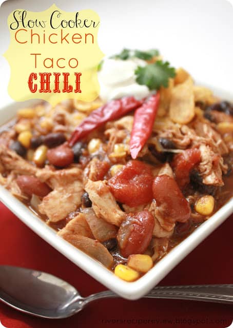 Slow cooker chicken taco chili in a white bowl with a spoon on the side. 
