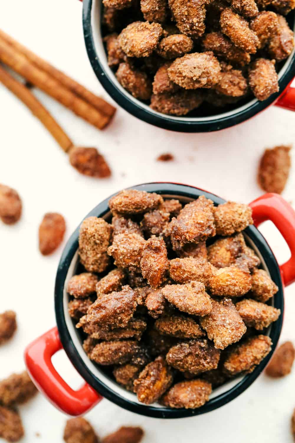 Slow Cooker Cinnamon and Sugar Almonds in a cup.