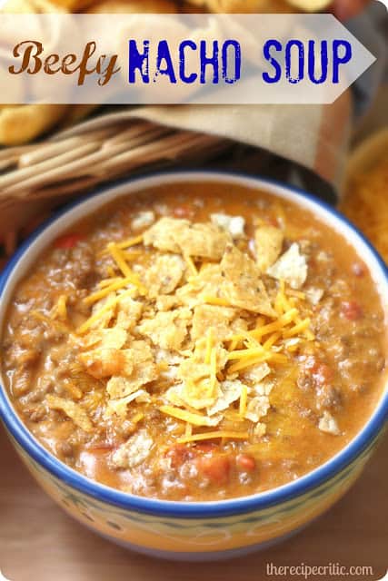 Beefy nacho soup with tortillas on top. 