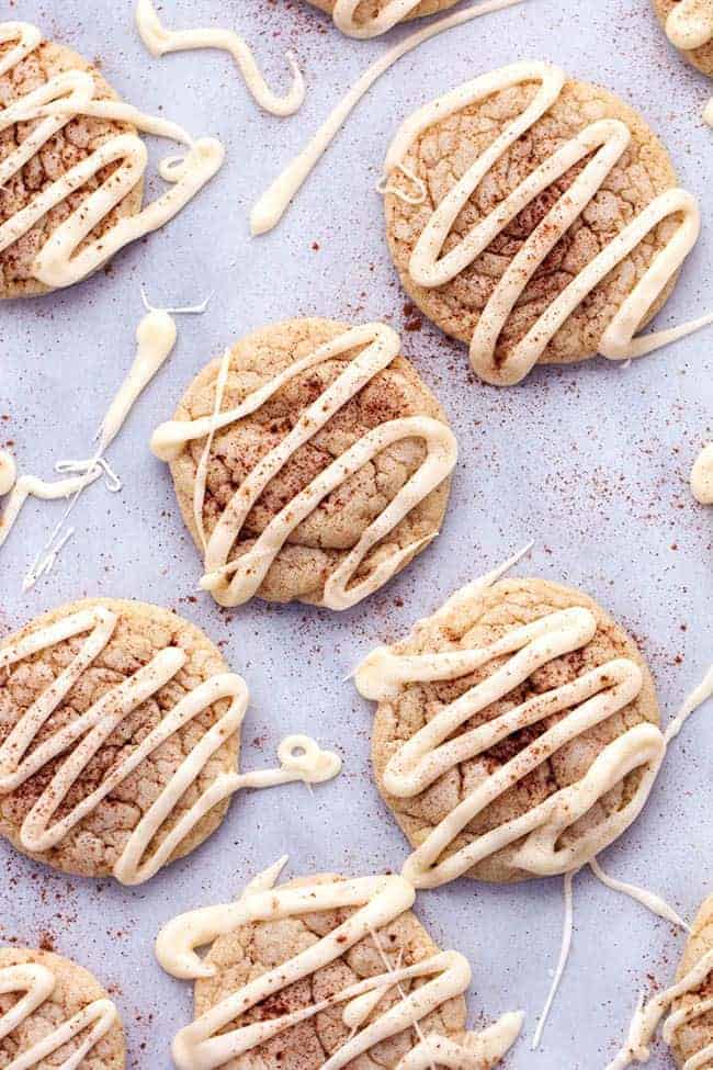 Eggnog cookies with icing drizzled overtop. 