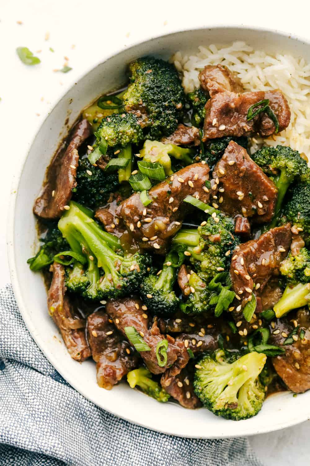Slow Cooker Beef and Broccoli with rice in a bowl. 