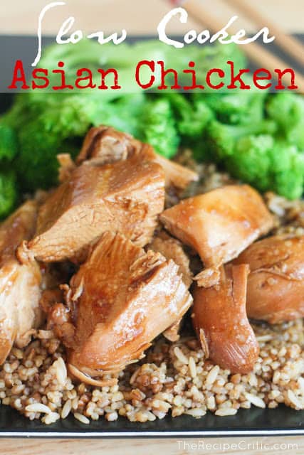 Bite sized pieces of slow cooker asian chicken on top of rice with broccoli beside it.