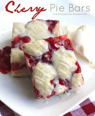 2 cherry Pie Bars on a white plate.
