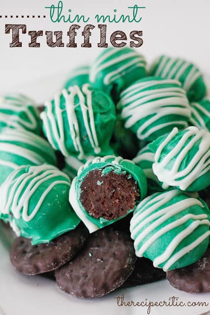 A stack of green thin Mint Truffles on thin mint cookies.