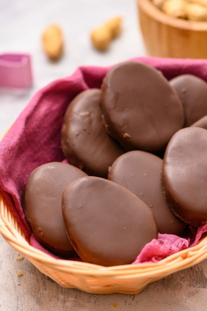 Homemade Reese's eggs in a basket.