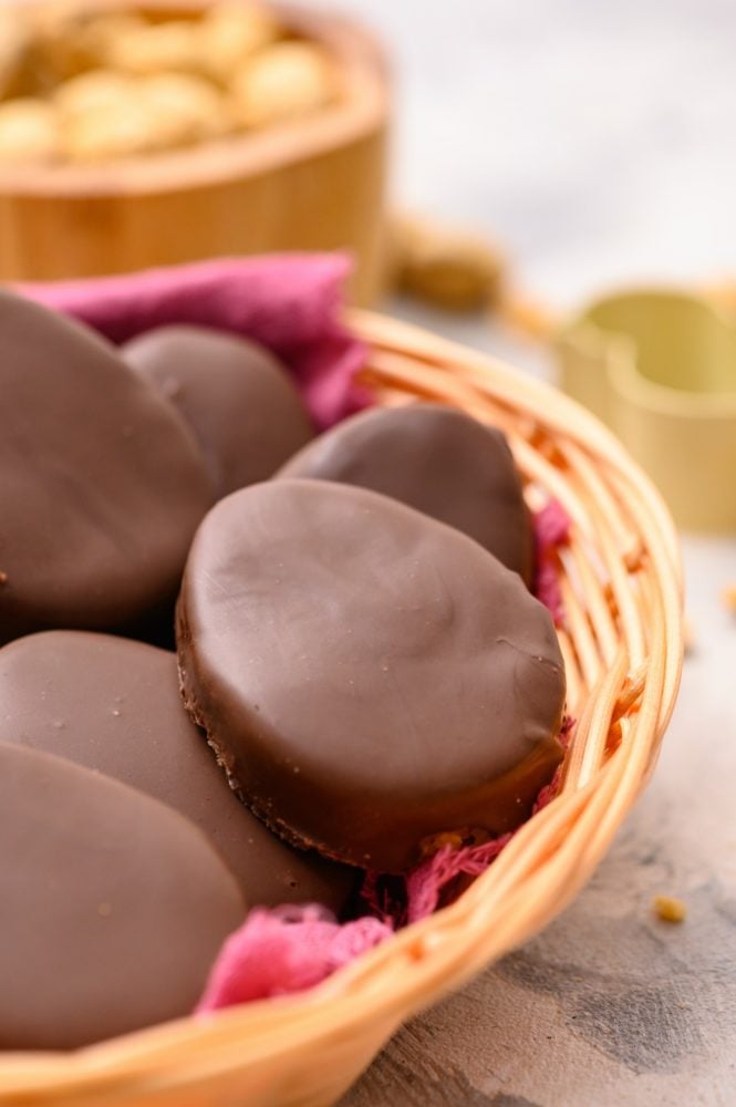 A basket full of homemade Reese's peanut butter chocolate eggs. 