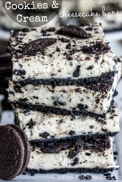Cookies and cream cheesecake bars in a stack of 4.