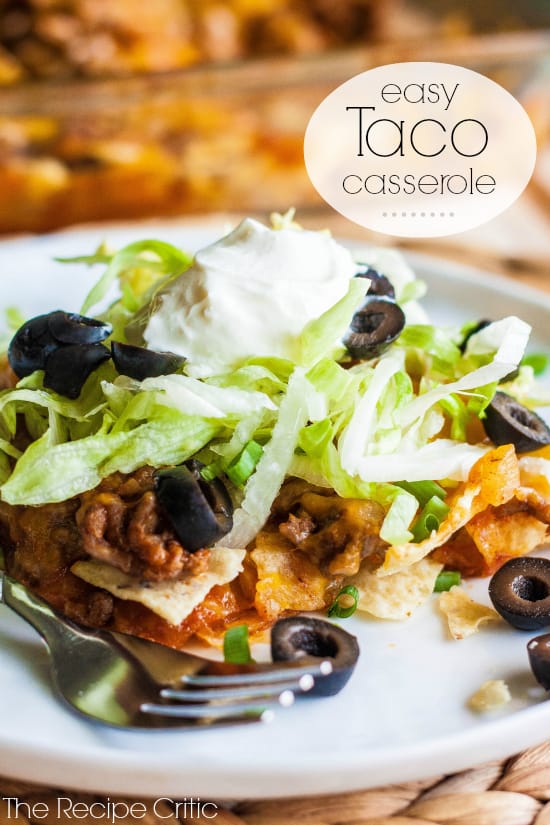 Easy Taco Casserole on a white plate with a metal fork. 