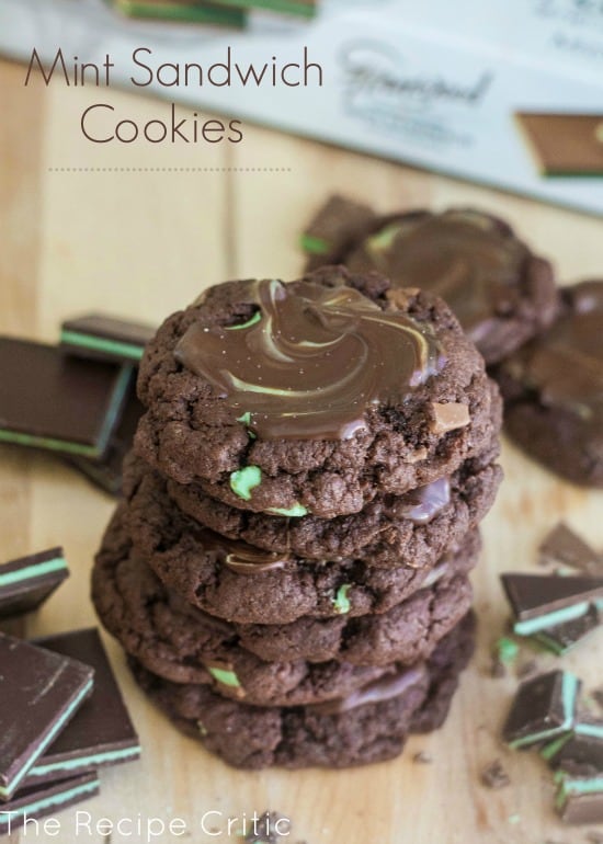 Mint sandwich cookie stack of 6 with mint chocolate candies around.
