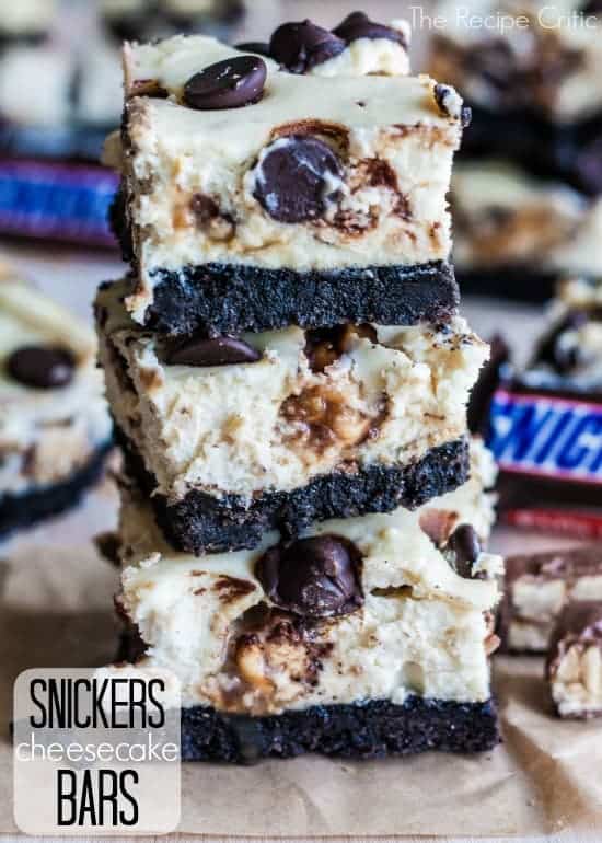 Stack of 3 snickers cheesecake squares.