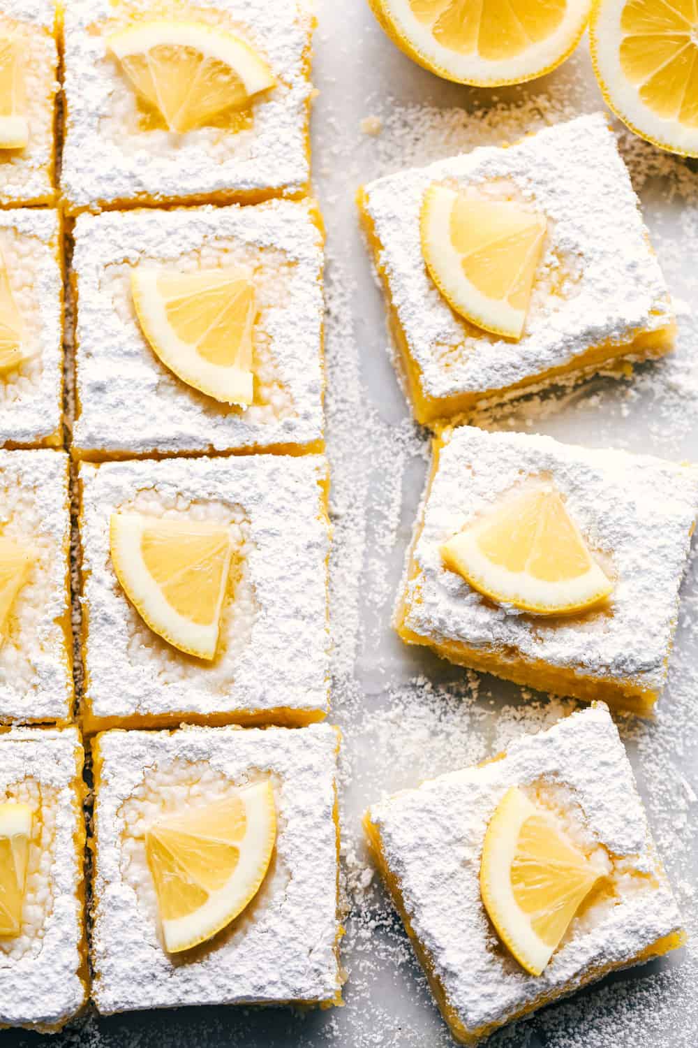 Lemon bars cut into squares.