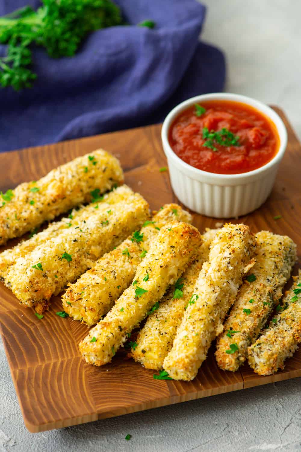 Baked zucchini fries with marinara sauce on the side