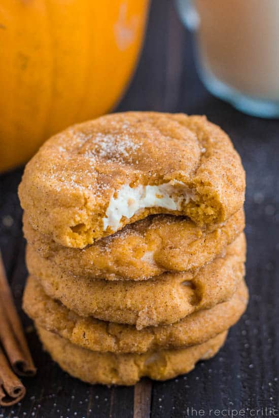Pumpkin snickerdoodle stack of 5 cookies. One has a bite taken out.