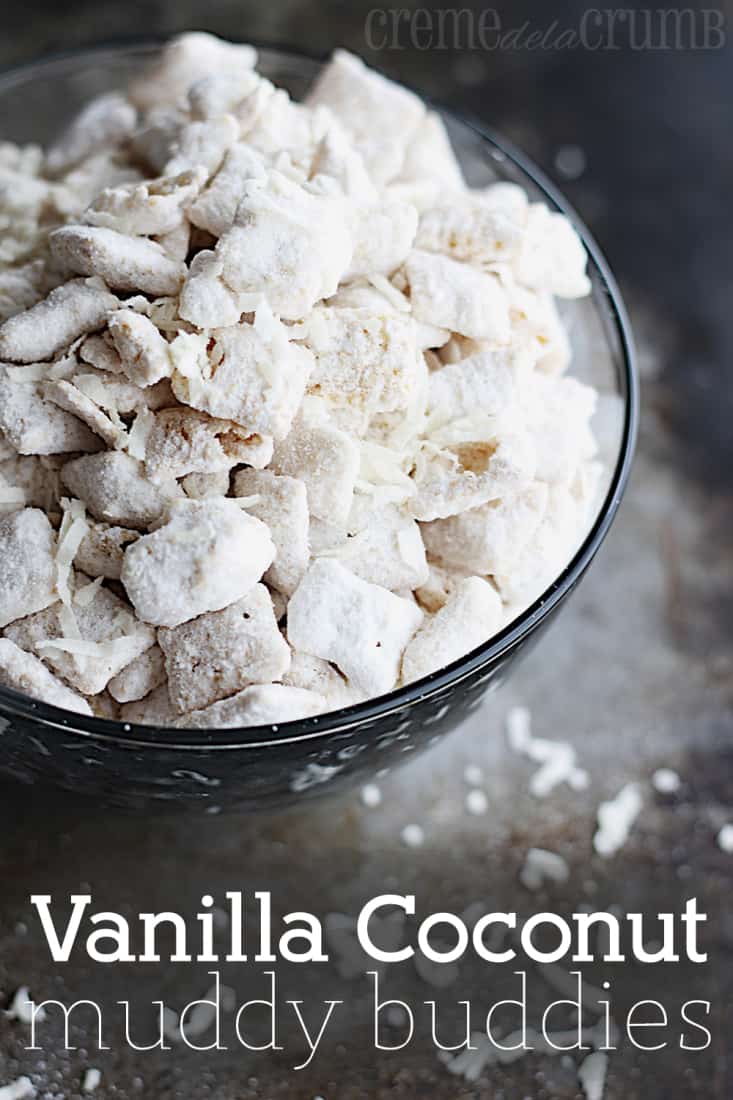 Vanilla coconut muddy buddies in a glass bowl.