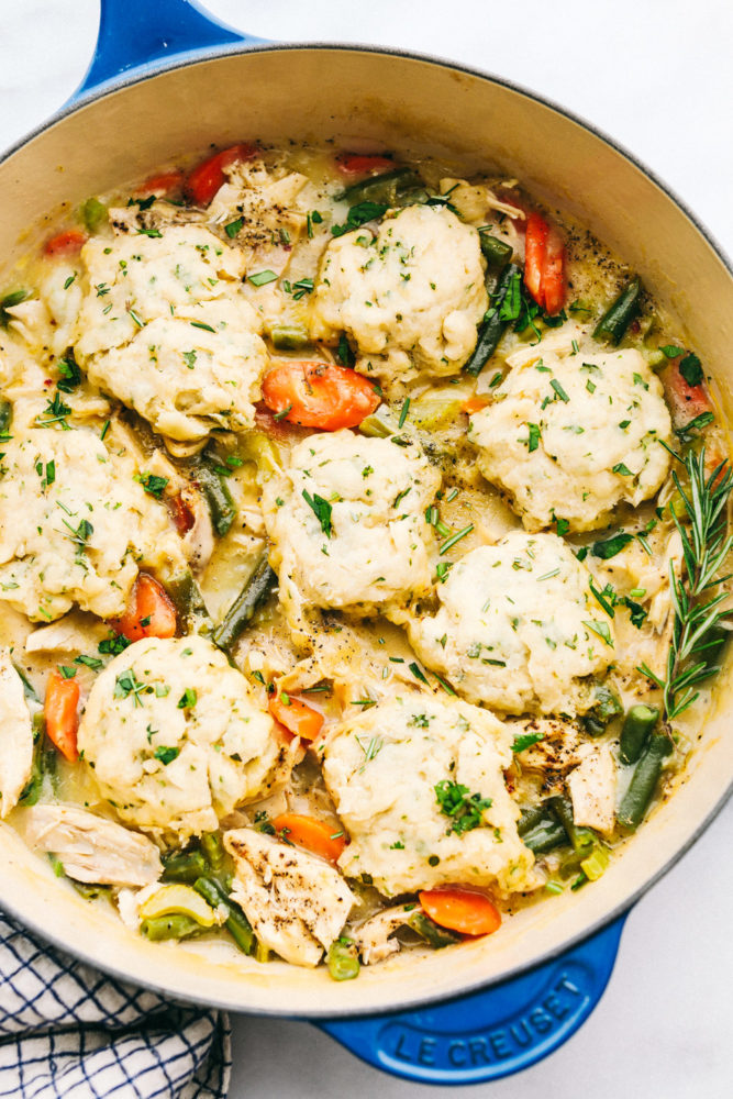 Chicken and dumpling with carrots and beans. 