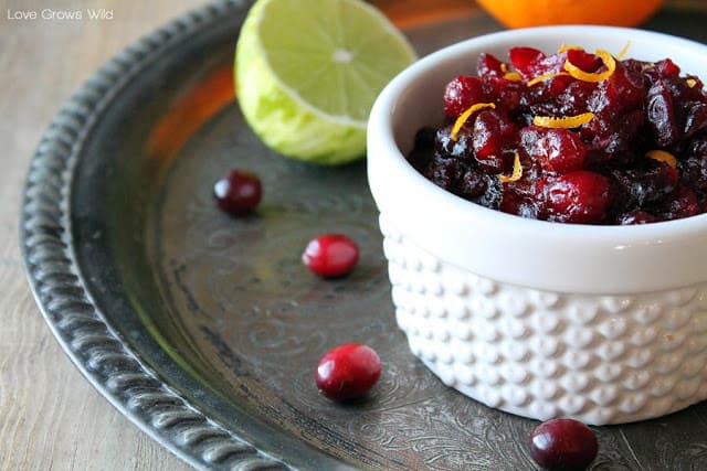 Orange and Lime Cranberry Sauce in a small white cup.