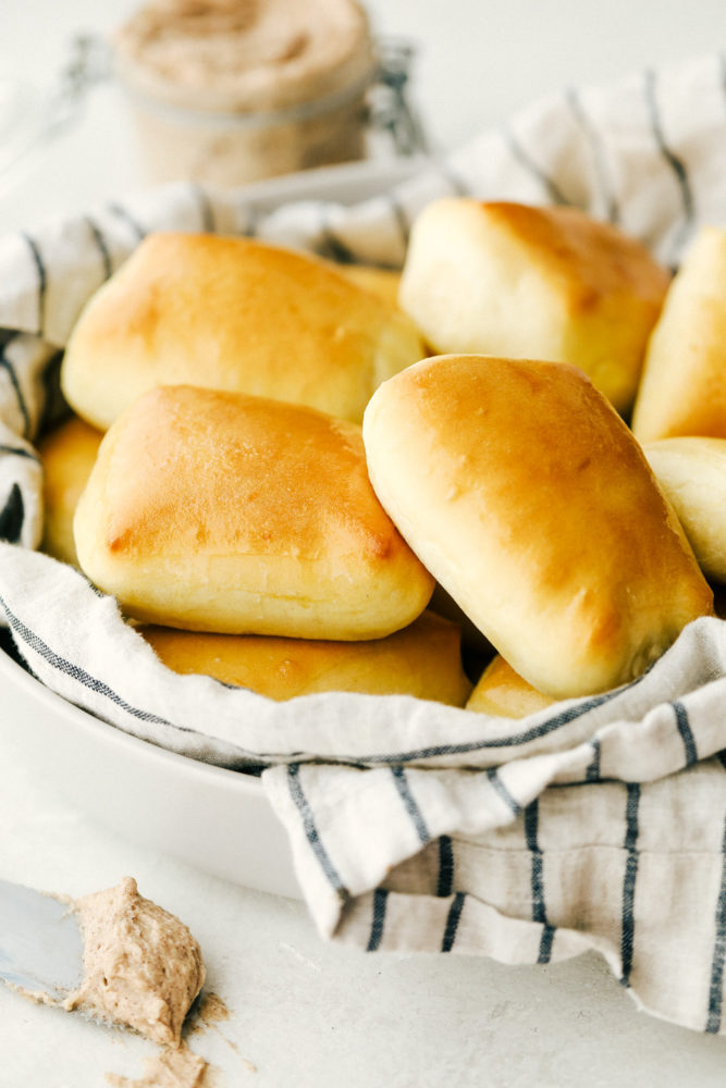 Fluffy soft Copycat Texas Roadhouse Rolls with Cinnamon Honey Butter.
