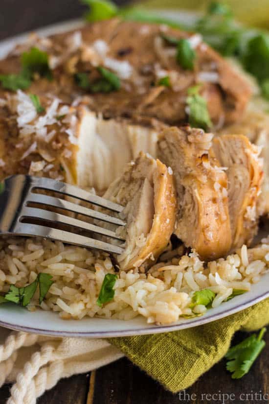 Coconut chicken bite on a fork.