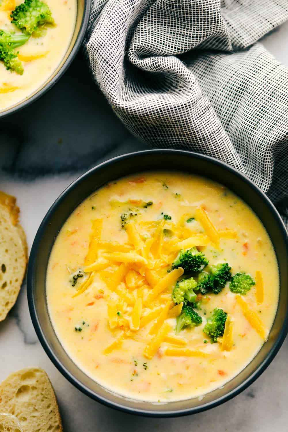 broccoli cheese soup with cheese and broccoli on top