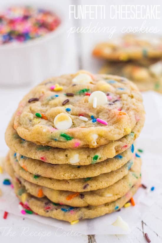 Funfetti Cheesecake Pudding Cookies stacked on top of one another. 