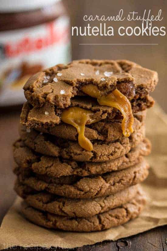 Caramel Stuffed Nutella Cookies that are stacked on top of each other. 