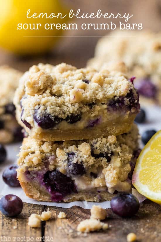 Lemon Blueberry Sour Cream Crumb Bars stacked on top of one another. 