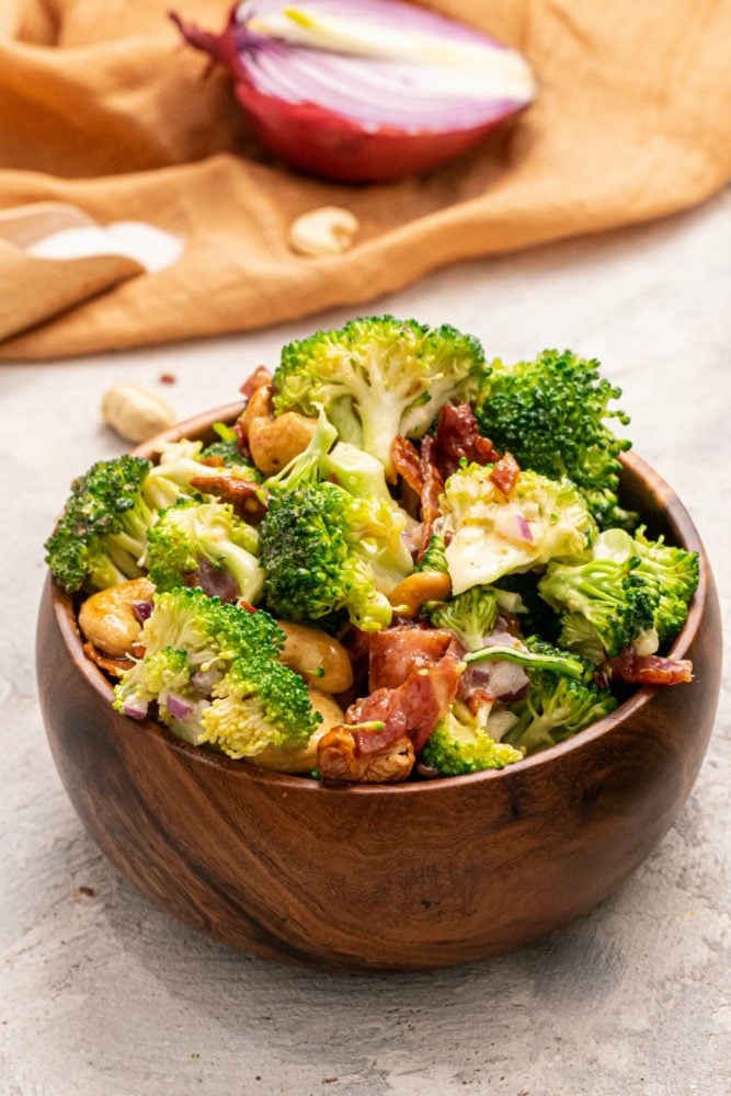 Cashew Broccoli Salad in a wooden bowl.