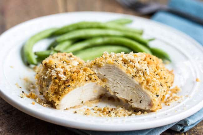 Ritz parmesan chicken on a white plate. 