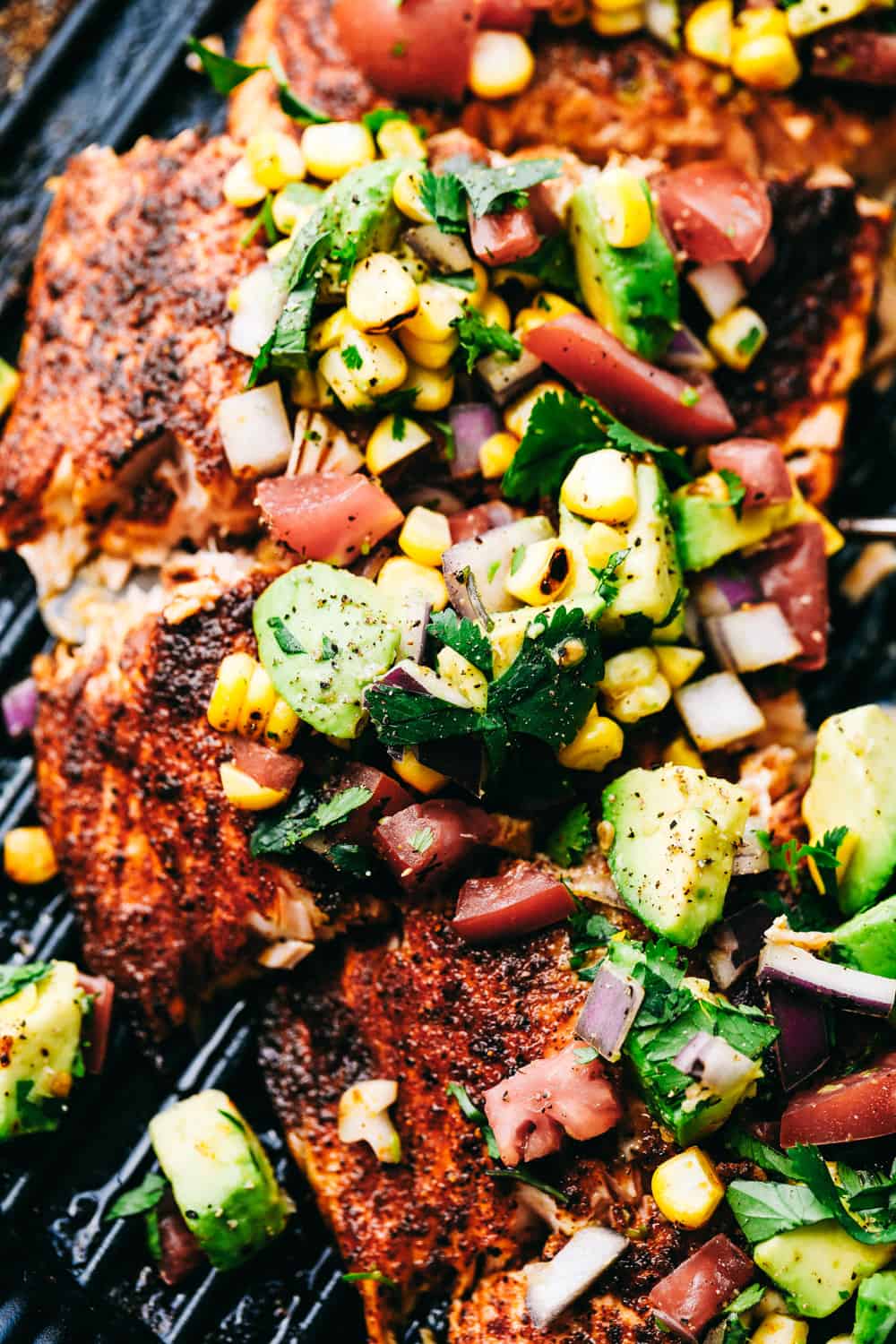 Close up of Grilled Salmon with Avocado Salsa.