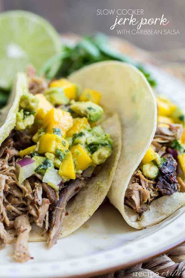 Slow cooker jerk pork with Caribbean salsa tacos on a white plate. 