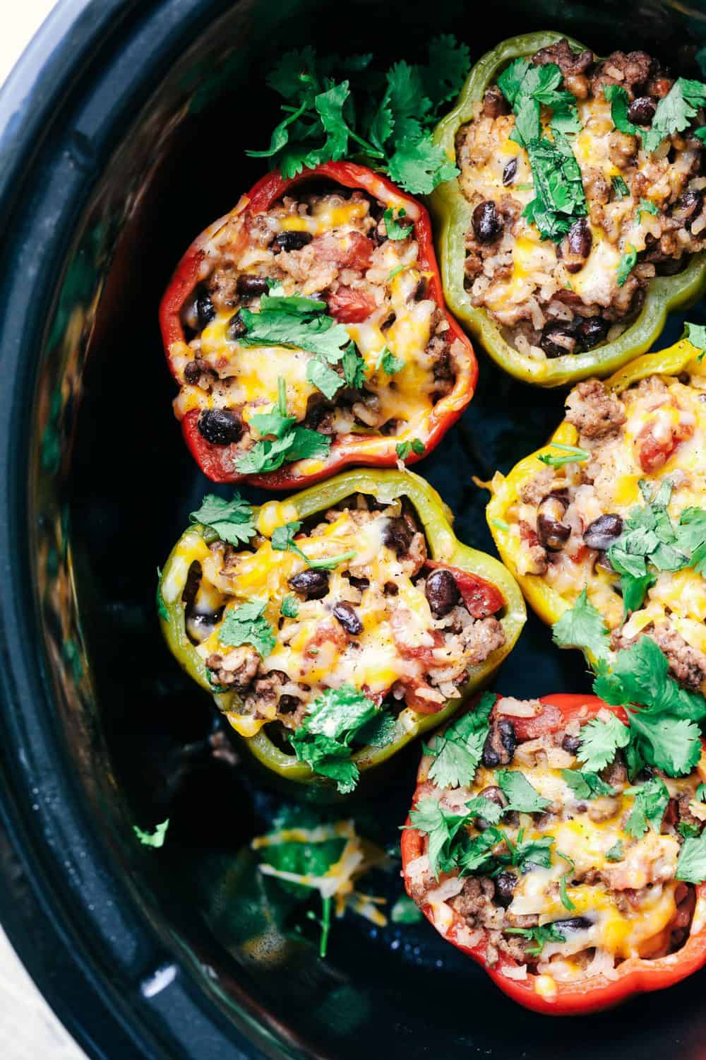 Overhead shot of slow cooker stuffed bell peppers.