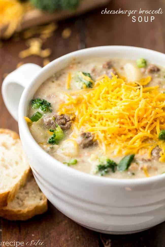 Cheeseburger broccoli soup in a white bowl cup with a handle on the side. 