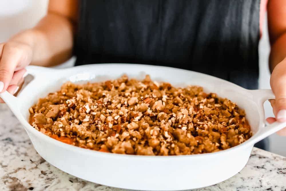 sweet potato casserole in a white casserole dish 