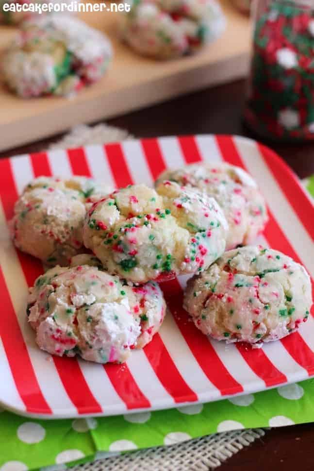 Christmas Gooey Butter Cookie on a white and red striped plate. 
