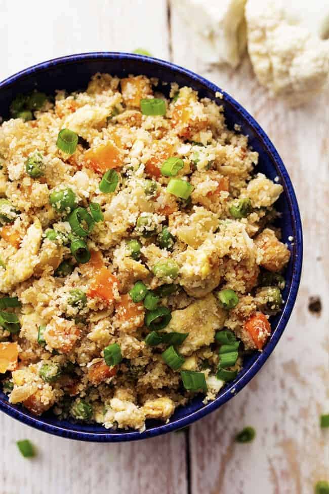 Cauliflower fried rice in a blue bowl.