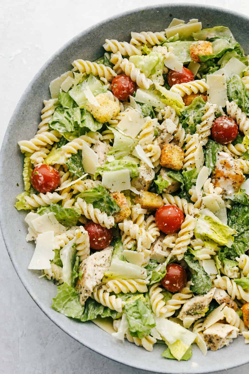 Caesar Salad with chicken and pasta in a bowl!