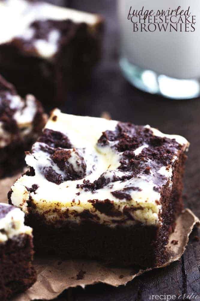 Close up on a fudge swirled cheesecake brownie.