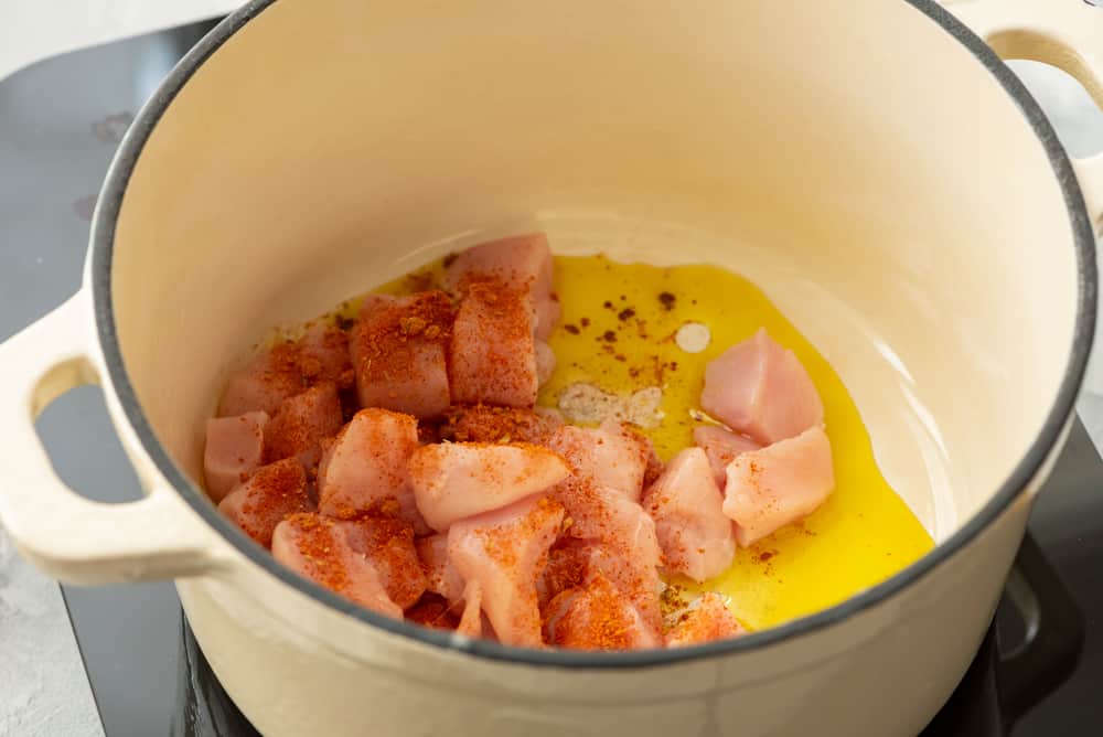 chicken in the one pot getting ready to be cooked