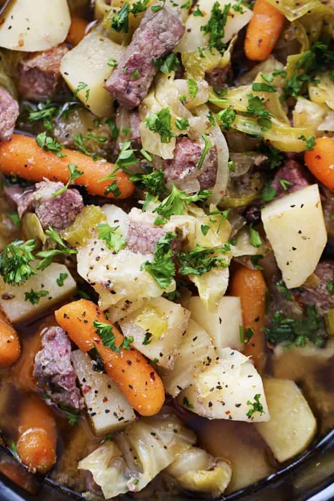 Corned beef cabbage stew close up on ingredients.