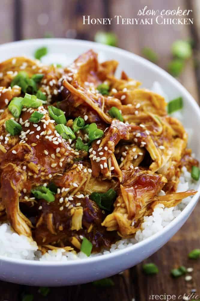 Honey teriyaki Chicken on rice in a white serving bowl.