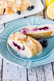 Blueberry Lemon Cream Cheese Bread on a blue plate by Deliciously Sprinkled
