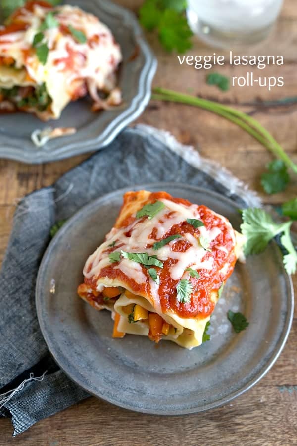 Veggie Lasagna Roll-up serving on a grey plate.