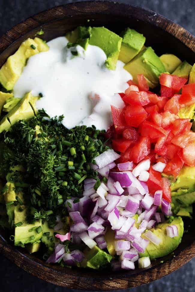 ranch guacamole ingredients in a bowl.