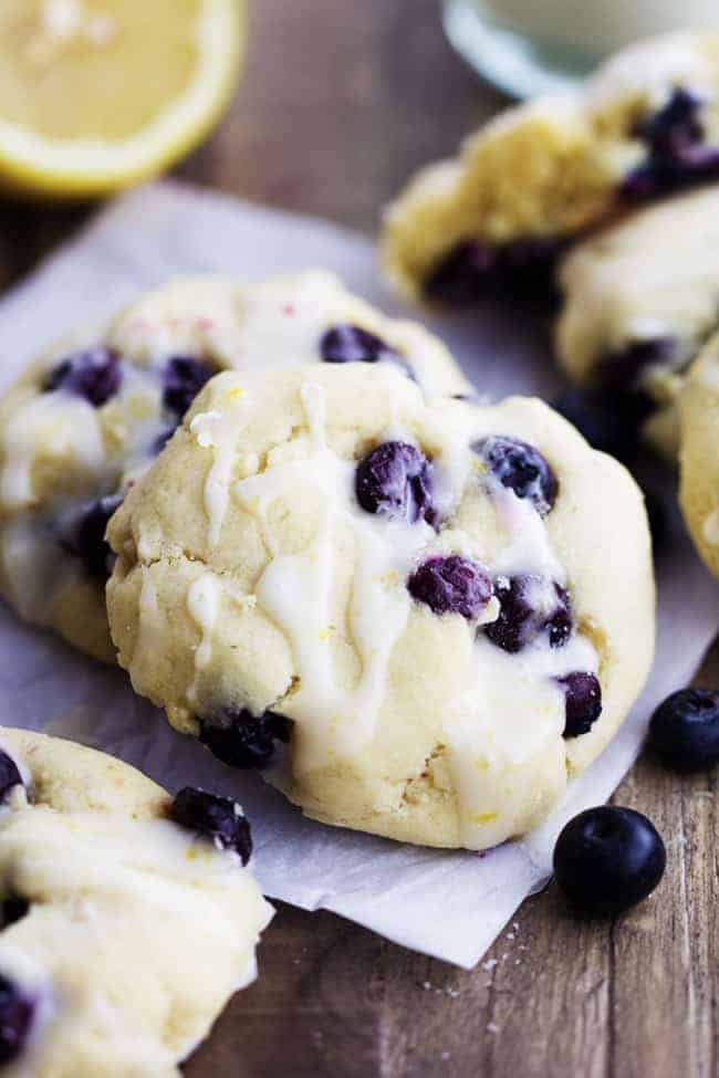 Close up on two blueberry cream cheese cookies.